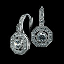 These are Beverley K 18k diamond lever back earrings.  The center diamond is bezel set and is surrounded by an octagonal pave diamond halo.  There are also pave diamonds going up the lever backs. These earrings measure approximately 17mm heigh by 10.4mm in width. Total diamond weight is .68ct.  The diamonds quality is SI1 with an H color.