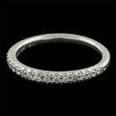 From Michael B's Petite Touch Collection a 18kt white gold diamond pave wedding band set with diamonds 1/2 way around the band. The ring is set with 17 diamonds weighing .18ct total. The diamonds are VVS E-F in quality. The ring is 2.0mm in width and another amazing setting job by Michael.  No catching! Made in the USA!