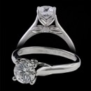 Classic solitaire with a softly curved, and graceful polished shank.   The forget-me-not floral basket nestled a precious diamond or colored gemstone center piece.