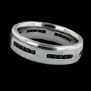 The platinum Canyon wedding band by Whitney Boin. Set with .66ctw of black diamonds and measuring 6.5mm in width.  Classic and comfortable. Available in all finger sizes.  Hand made in America.
