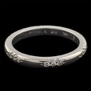 From the Touch Collection a 1.9mm 18kt white gold Lace wedding band. The diamonds go all around the ring and weigh .21ct total with 18 diamonds. Pretty, pretty, ring and as all of Michael's work total perfection.