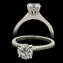 A wonderful 18kt white gold Petite Touch Collection engagement ring. The piece is set with 20 diamonds weighing .14ct total. VVS E-F quality. The ring measures 1.8mm in width. This ring is very petite and perfect for a 1/2ct and larger diamond. This is one amazing setting job. Diamonds are 1/2 way around the ring.