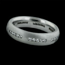 Platinum wedding band by Whitney Boin. This band is 5mm wide and contains .45ct. total weight in diamonds.