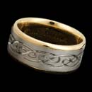 A very cool 18kt two tone "Celtic" ring measuring 9.5mm in width. Deep engraving and very comfortable.  Available in all white or yell along with platinum.