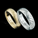 Before Steven passed away he designed these wedding bands, ''Rubber side down'', for his love of motorcycles.  These are platinum and 18kt gold and are 6mm each. It is our honor to present these for our friend Steven. Starting in size 7.
