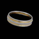 Designed by Christian Bauer, this handsome two-tone platinum and 18kt yellow gold wedding band measures 6mm. Also available in 18K and 14K gold.
