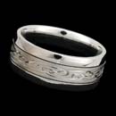 A classic 18kt white gold "Celtic" ring measuring 9.0mm in width. Deep engraving.  Available in yellow gold and platinum.