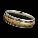 A favorite of ours!  This is a wonderful 18kt two tone gold 7mm wide band.  Available in all white and yellow gold and platinum.