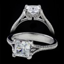 A unique 18kw princess Bridget Durnell engagement ring. The sides of the ring feature a 2 row of diamonds that have a total carat weight of 0.35ctw. 