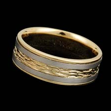 A beautifully engraved 18kt gold two tone band measuring 7.0mm in width. Available in all white or yellow gold and platinum.