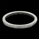 From Michael B's Touch Trois Collection an 18kt white gold full eternity ring set with 51 diamonds weighing .25ct total. VVS E-F ideal cut diamonds and the ring is 1.6mm in width. Nearly impossible to set diamonds this size in the micro pave setting style. Michael B is the master of this setting and the ring is just beautiful. I call it a wisp. Great for stacking rings.