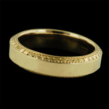 This is a gorgeous mens wedding band by Michael Beaudry . The size of the ring is 9 with a thickness of 5mm. It is absolutely flawless and made of 18kt yellow gold ring. Please call for current pricing information.
