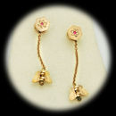 A rare set of rose gold sweater pins ca 1890's set with rubies.  The piece is 55mm in length and 10mm in width.