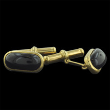 Beautiful 18kt yellow gold black onyx cuff links.  These are made in Italy.