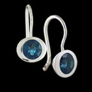 Clean and contemporary, these sterling silver and London Blue Topaz earrings from Bastian Inverun will be a pair that you will wear and enjoy for a lifetime. Stunning color and fluid design. 10.6mm wide and 20.4mm in length. 3.0ctw blue topaz.