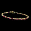 Alternating ruby and diamond bracelet from Spark. The bracelet is set with 0.84 carats total weight of round diamonds and 6.44 carats total weight of oval rubies.