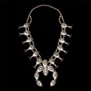 A very fine sterling silver Navajo squash blossom necklace circa 1950's. This piece measures 24 inches with a 4'' x 3 1/4'' Naja. A great addition to any collection.