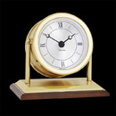 The Chatham by Chelsea Clock's makes a dramatic statement by combining the sleek look of a hand finished mahogany base with a forged brass case and mountings. This attractive clock features a swivel-style case, richly silvered dial, a precision German quartz movement, and a matching engraving plate for presentations. This clock is also available with a black marble base. The clock has a 3 inch dial with overall measurements of 5 inches in height and 7 inches in width. The clock weighs 8 pounds and also comes with a two year warranty. 