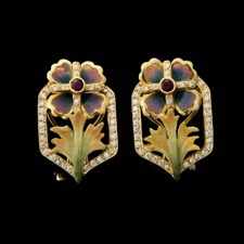 Nouveau Collection's 18kt yellow gold combined enamel earrings with 36 diamonds and one ruby in each earring. A total of .60 ct.
