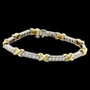 A beautiful 18kt yellow gold and platinum diamond bracelet by Gumuchian NY.  The piece is set with 45 .05ct diamonds having a total weight of 2.25ct.  The diamonds are VS1 clarity and F color.  This Gumuchian bracelet  measures 7 inches and weighs 22.3 grams.  Very solid piece.  Side to side it measures 5.3mm.  From the Hugs and Kisses collection.  Although the piece is 25 years old it  looks like it was never worn.  Mint condition!  Retail new $10,500.00