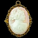 A really pretty pink shell cameo from the 1890's.  The piece can be worn as a pin or pendant. Measures 35mm x 27mm and weighs 7.4 grams.  All gold is also tested by us.