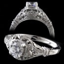 Very beautiful platinum diamond Edwardian era style ring. The ring is set with .06ct of VS F ideal cut diamond. Stunning hand carving and filigree really stand out wonderfully with this ring. Made for a .40ct to 1.25ct diamond. (center diamond not included) Available also in 18kt & 14kt white or yellow gold. 9.5mm at the top and tapers. You'll like this ring it's solid and die struck the best.  Made in the USA!!