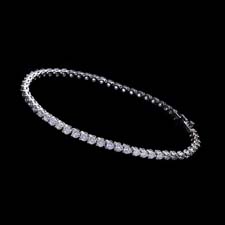 Gumuchian's famous straight line diamond bracelet.  These start at 4.0ct and can be made in most diamond sizes