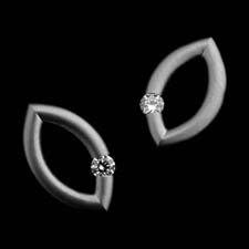 A look into innovation at its best from Steven Kretchmer.  A simple mango shape in these beautiful matte finished platinum earrings, with tension set round diamonds. They are also available in a high polish finish.