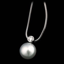 Whitney Boin platinum 10mm south sea pearl and diamond pendant with 18 inch 1.2mm snake chain.
The diamond is a .10ct VVS E-F ideal cut