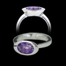 Clean styling in this sterling silver ring by Bastian Inverun. The ring is bezel set with an oval amethyst weighing 1.98 carats. The ring measures 13.8 x 8.4mm at the top. The ring shank measures 3.0mm.
