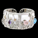 The Sea Of Life sterling silver bracelet. The bracelet features a mother of pearl as the backdrop to the hand made aquatic gemstones.
Dimensions: 35mm