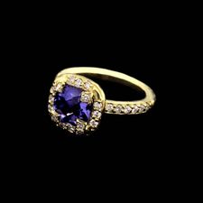 SeidenGang ring done in all 18kt. green gold and accented with .40ctw in diamonds. The ring is set with a 8mm cushion cut iolite.