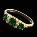 This Charles Green 18kt yellow gold Victorian style engagement ring gleams with .50ctw of emeralds and .07ctw of diamonds. A truly beautiful ring for that special woman in your life. 