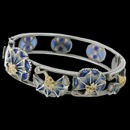 A work of art that is made from hand. The bracelet is from the Nouveau Collection and is made from 18k gold and silver with blue enamel going across the piece. There are 41 diamonds place, intricately around with a total carat weight of 0.51tcw. The bracelet weighs 1.87 grams.