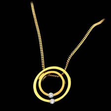 Eddie Sakamoto Yellow gold circle diamond pendant by Sakamoto