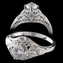 Stunning platinum Edwardian style diamond ring. This is a handmade filigree design with hand engraving. The ring is set with .18ct of VS F-G ideal cut diamonds. Needs a 3/8ct to 1 1/2ct center diamond (center diamond not included) The ring is a 9.4mm width and tapers. Available in 14kt and 18kt white or yellow gold.This ring is "die struck" and the finest made.  Made in America.