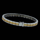 One of Spark's best sellers. this 18 karat white gold bracelet is set  with 1.84 carats total weight of diamonds and 4.65 carats total weight of round yellow sapphires.