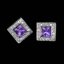 Chris Correia ladies platinum, diamond and tanzanite earrings with 5mm tanzanites.