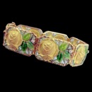 A beautiful 18k yellow gold art nouveau inspired bracelet. The green leafs are enamel with 7 diamonds going around each link. The total carat weight is 0.20tcw. The bracelet measures 17mm x 180mm.