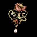 Your emotions soften as you enter this colorful garden. Give yourself to the relaxing hues of Nouveau Collection's 18kt yellow gold and the pink and green enamel work. With diamonds,emeralds and pearls this brooch pendant is a wonderful piece.