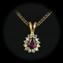 This rich Thai Ruby is set in 18kt yellow gold and weighs .50ct.  The piece is surrounded by diamonds with a total diamond weight of .26ct.  The piece is suspended on an 18 inch, 18kt yellow gold box chain.