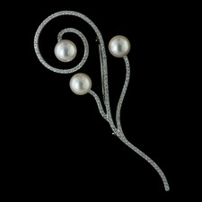 A beautiful Spiral Flower pin from Michael B.  This handmand platinum pin has 3 8.5mm pearls and .75cws of pave diamonds.  