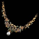 This beautiful and intricate Nouveau Collection necklace features an elaborate enamel and diamond floral design and is accented with a drop pearl.