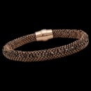A trendy sandy brown Silver and Silk Peter Storm Bracelet. Comes in various colors; perfect for mixing and matching. The barrel clasp is made of sterling silver. This bracelet measures 19cm(7.5'') long. Matching Blue Silk bracelet is SKU 07OO4