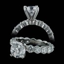 This is the best shared prong engagement ring made.  This Memoire petite prong eternity band with head appeares as a ring of fire around the finger. This ring contains 3.0ct. tw in diamonds. This is available in platinum or 18kt gold from .50ct to over 8.0ct in diamond weight and starts at $2,600. Exquisite!! Center stone not included.