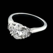Clean and classic: Alexander Primak platinum and diamond 3 stone engagement ring set with .96ctw in full-cut side diamonds. Center stone 1.0ct oval included.