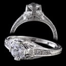 Classic handmade platinum diamond ring set with .12ct of VS, F, ideal cut diamonds. This ring is made to hold a 3/8ct - 1.25ct center diamond ( center diamond not included)  Beautiful filigree and hand carving this is the finest "die struck" ring made. 7.2mm at the ring top and tapers. Available in 18kt & 14kt white and yellow gold.  Made in America.
