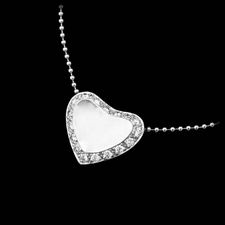 The Baci heart pendant shows .20ctw of diamonds beautifully set in platinum, and suspended from a platinum bead chain.  Designed by Michael Bondanza.