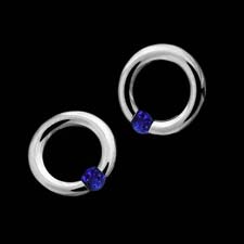 Exotic .950 platinum micro earrings from Steven Kretchmer, with very intense blue sapphires.  The earring is 10.0mm and contains .20ctw of sapphires.