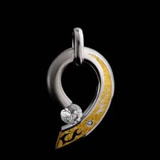 The water/fire comet pendant by Kretchmer has striking detail in its design, with platinum and 24kt yellow gold inlay. Note the cost is for the mounting only. 1 3/4 in length.  Diamond sizes available 1/2 ct and larger and any shaped diamond or colored gemstone.  Handmade in America.